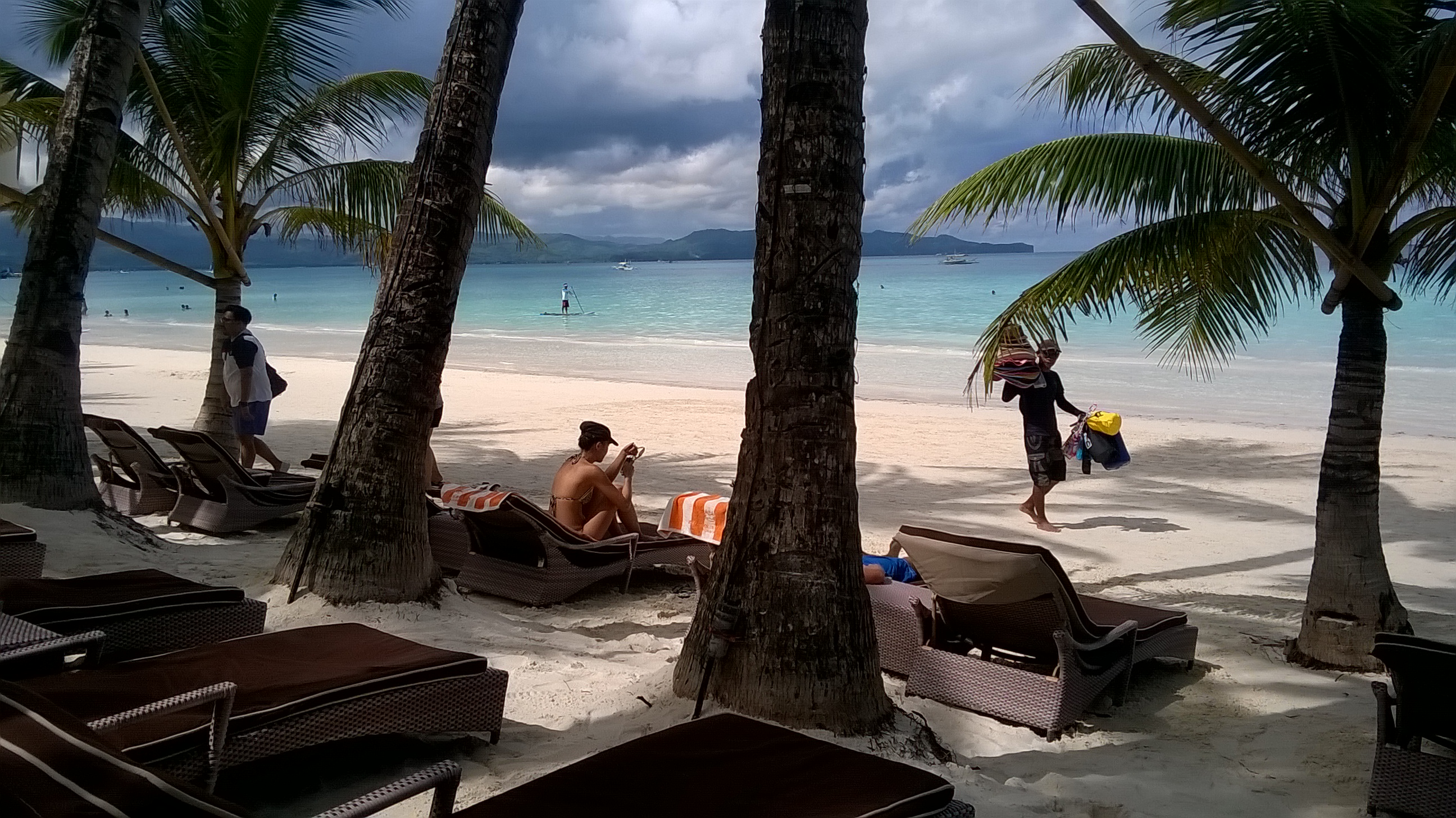 guests enjoying White Beach Boracay infront of Ambassador Hotel 
