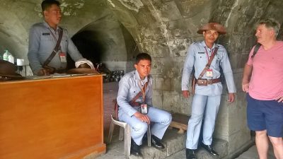 tourist having a chat with the local Intramuros guards