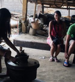 tourists enjoying our Vigan tour_ pottery making