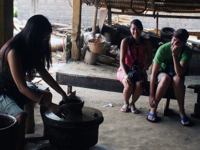 tourists enjoying our Vigan tour_ pottery making