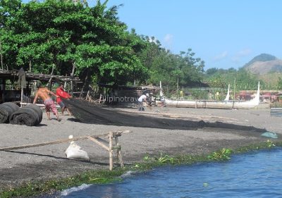 Taal lake with local fishermen at work