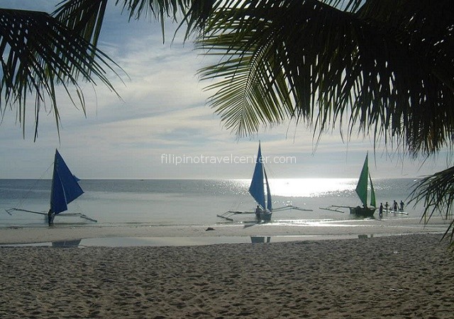 bancas on Boracay's White Beach Philippines